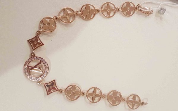 фото Золотой браслет БС330 свернут дугой