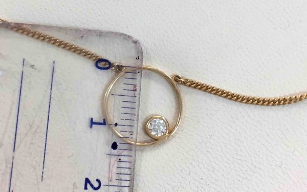 Фото Золотая цепочка ЦП247 кулон возле линейки