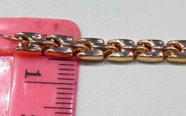 Фото Золотой браслет ДД11 возле линейки его ширина