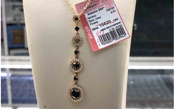 Фото Золотая подвеска ПВ765 в виде соединенных вертикально четырех кругов